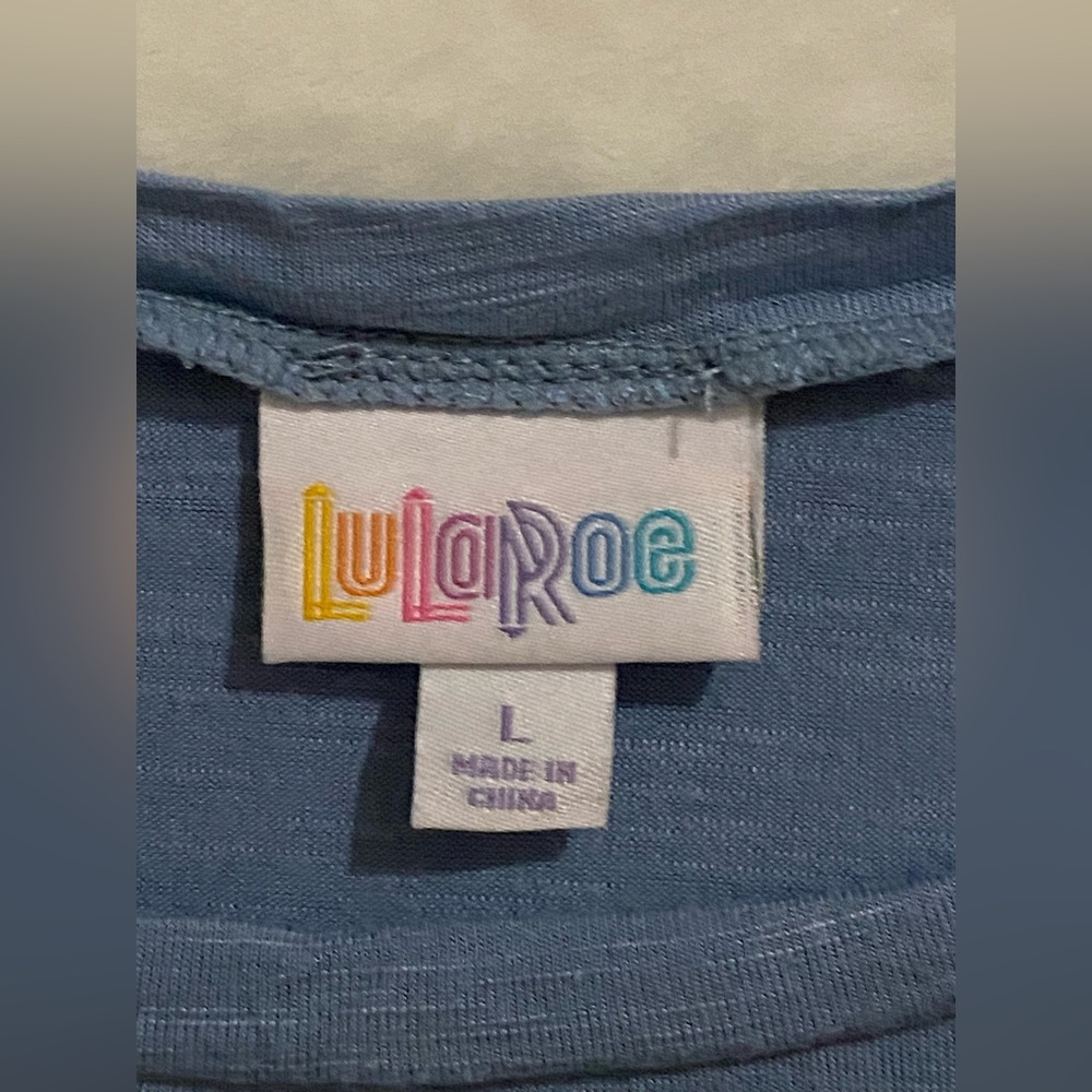 Lularoe tulip sleeve top.